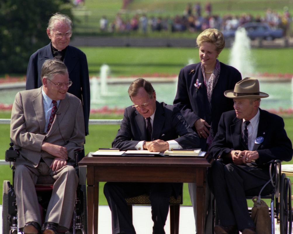 Picture of ADA signing with President Bush